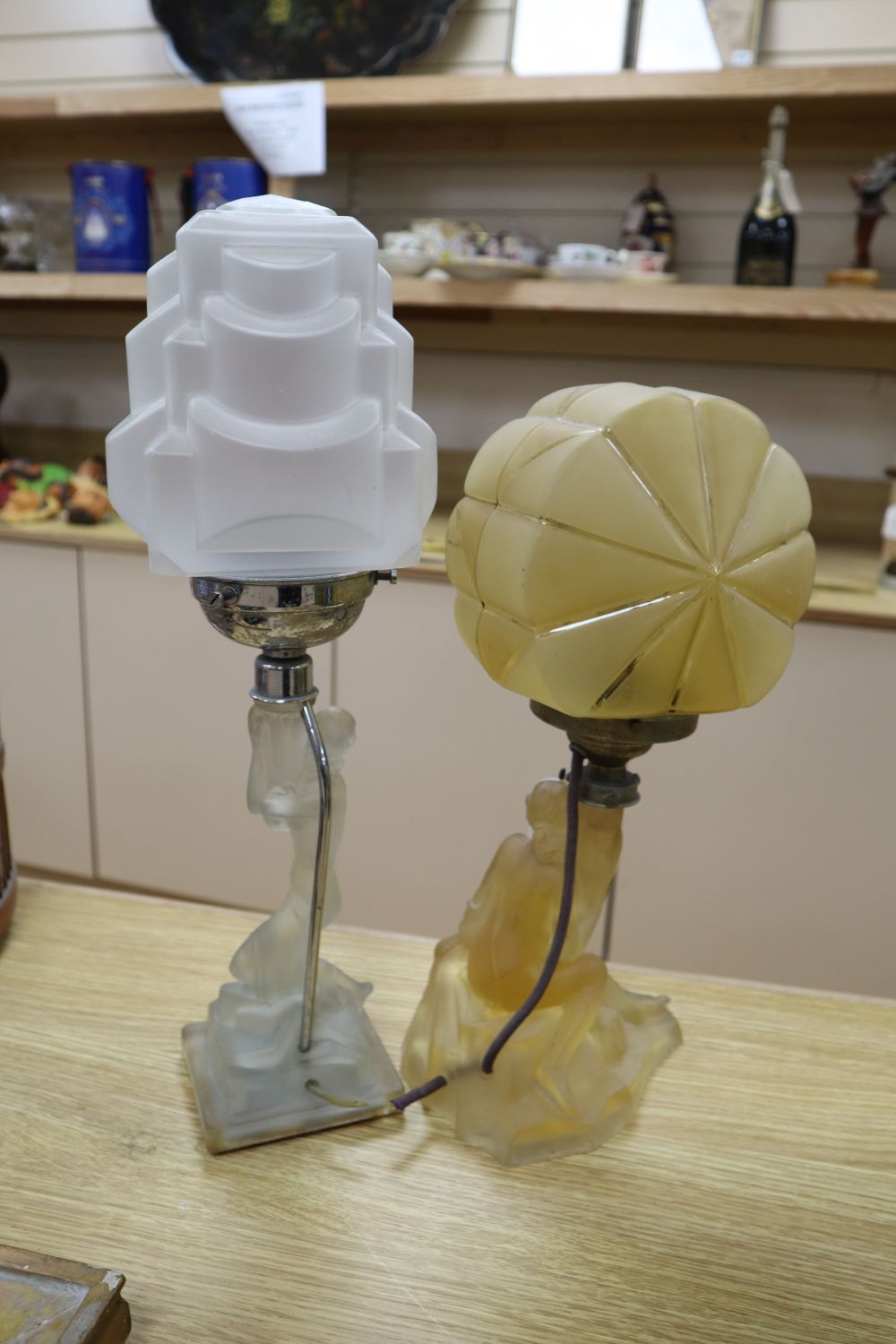 Two Art Deco pressed glass table lamps, largest 45cm